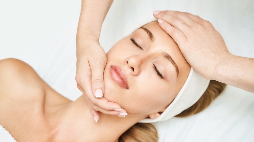 A woman having facial