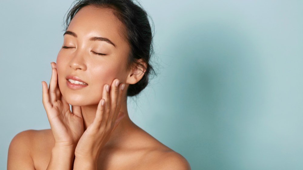 Skin care. Woman with beauty face and healthy skin portrait