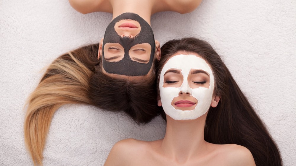 Young Women Getting Facial Treatment at the Spa
