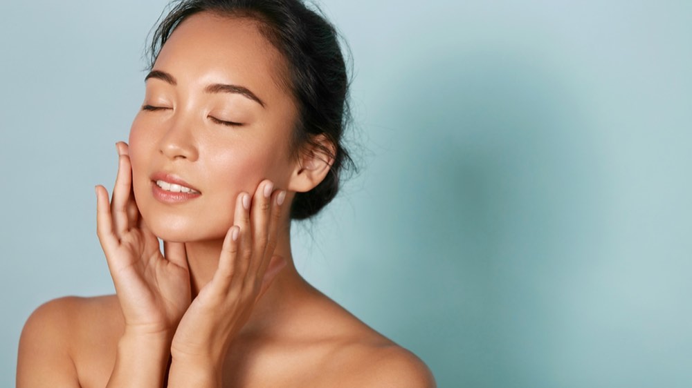 Skin care. Woman with beauty face and healthy skin portrait